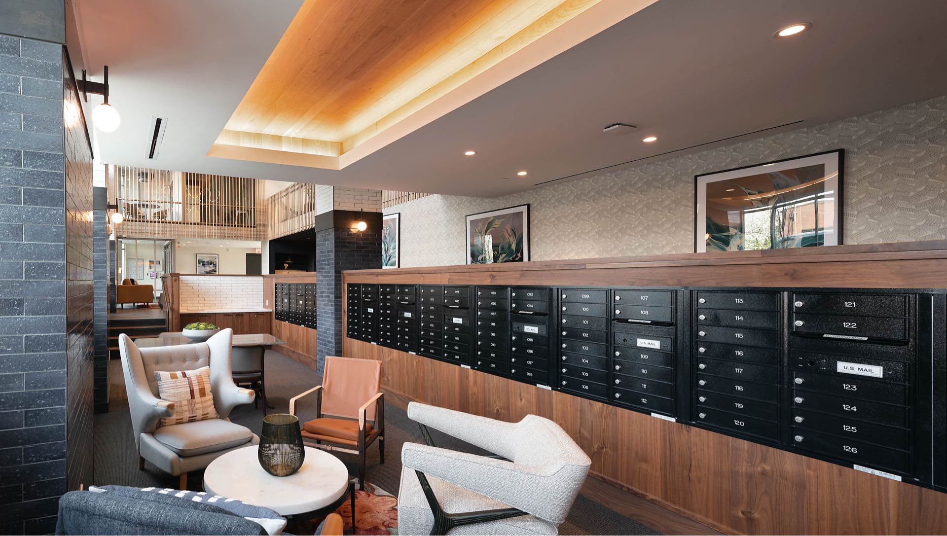 Faraday Park East secure mailroom with seating