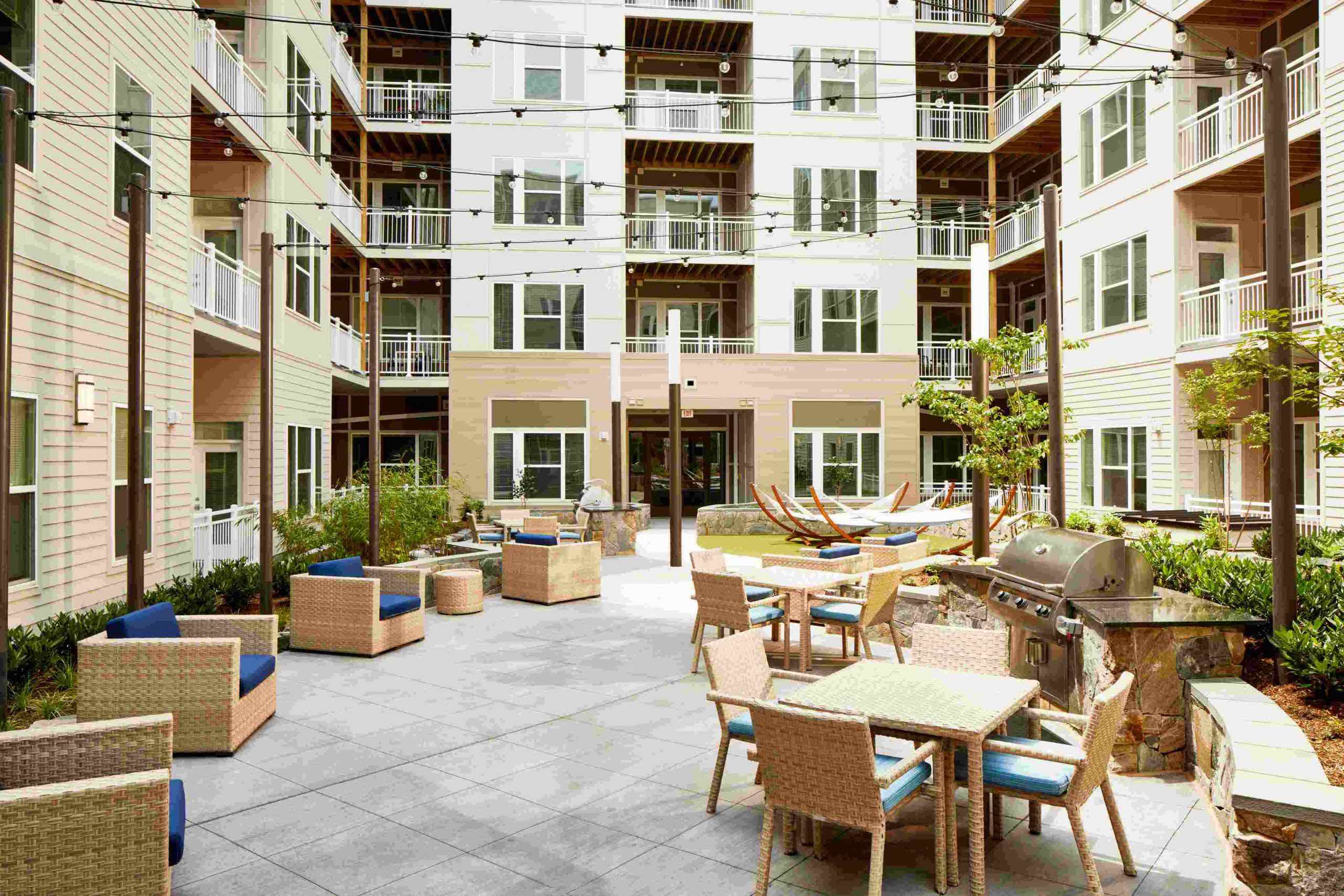 Ample outdoor space, including hammocks and grills, is just one of the perks of living at Faraday Park.